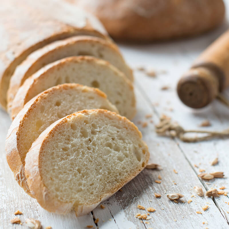 Fresh homemade bread on country table Freshly baked bread